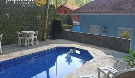 Casa em condomínio fechado com 4 quartos à venda no Balneário Praia do Pernambuco, Guarujá  por R$ 950.000
