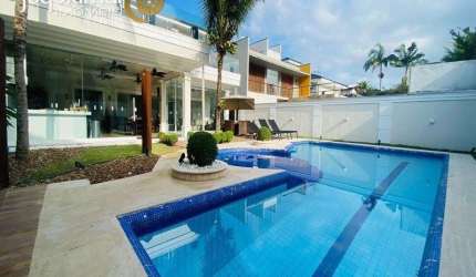 Casa em condomínio fechado com 5 quartos à venda no Jardim Acapulco, Guarujá  por R$ 3.800.000