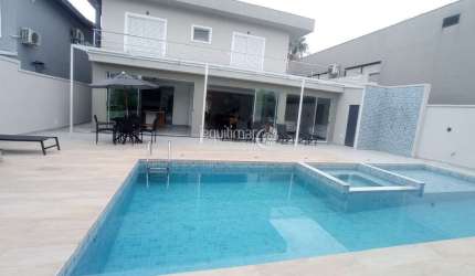 Casa em condomínio fechado com 6 quartos à venda no Jardim Acapulco, Guarujá  por R$ 3.900.000