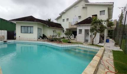 Casa em condomínio fechado com 5 quartos à venda no Jardim Acapulco, Guarujá  por R$ 3.600.000