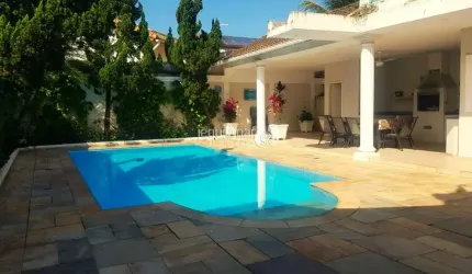 Casa em condomínio fechado com 4 quartos para alugar no Jardim Acapulco, Guarujá  por R$ 15.000