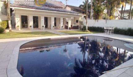 Casa em condomínio fechado com 5 quartos para alugar no Jardim Acapulco, Guarujá  por R$ 16.500