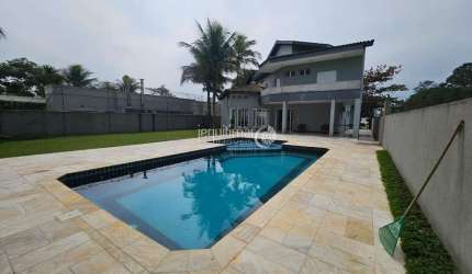 Casa em condomínio fechado com 5 quartos à venda no Jardim Acapulco, Guarujá  por R$ 3.000.000