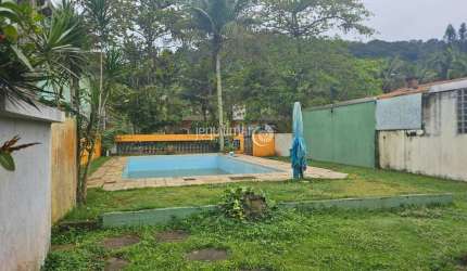 Casa em condomínio fechado com 1 quarto à venda no Balneário Praia do Pernambuco, Guarujá  por R$ 650.000