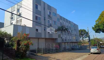 Apartamento à venda de 2 dormitórios, living amplo, cozinha americana