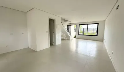 Casa 3 dormitórios,1 suíte com sacada, living 2 ambientes, churrasqueira, no Bairro Igara, na cidade de Canoas. Aceita Financiamento bancário e FGTS