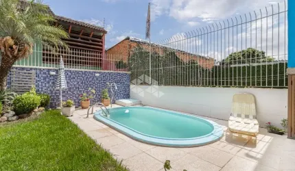 Casa 3 dormitórios com piscina  no bairro  Ipanema, Porto Alegre