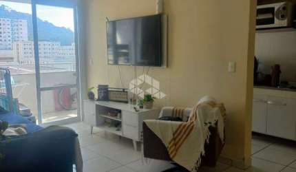 APARTAMENTO NO BAIRRO AREIAS, EM SÃO JOSÉ, SC, SACADA, CHURRASQUEIRA, 02 DORMITÓRIOS SENDO 01 SUÍTE, 01 VAGA DE GARAGEM.