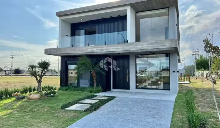 Casa de 4 suítes em condomínio fechado Sunset Xangri-lá