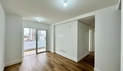 Apartamento com 2 dormitórios, 1 suíte, sacada com churrasqueira e vaga coberta. Aceita financiamento.