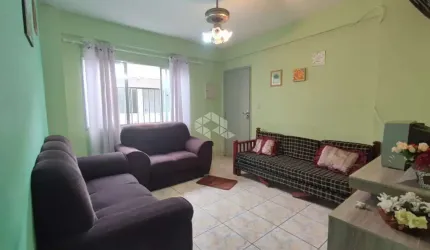 Apartamento a venda na praia grande, bairro ocian, com 2 quartos e 1 vaga.