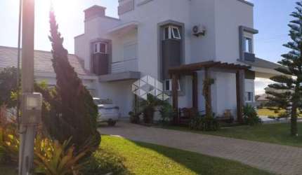 Casa á venda com 4 quartosdormitórios 3 vagasbox no condomínio Lagoa do Passo, OsorioRS