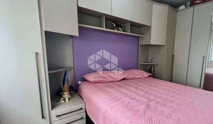 Apartamento semi mobiliado 2 dormitorio e vaga escriturada a venda no bairro Partenon.