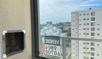 Apartamento novo de 2 quartos, sacada com churrasqueira e vaga no Morro Santana