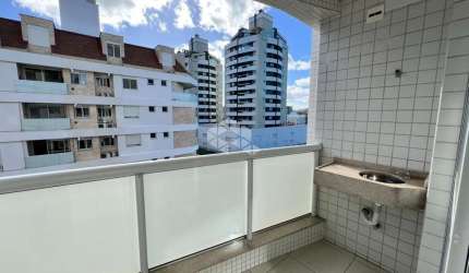 APARTAMENTO SEMIMOBILIADO COM 2 QUARTOS SENDO 1 SUÍTE  2 VAGAS E VISTA PANORÂMICA NA TRINDADE FLORIANÓPOLIS