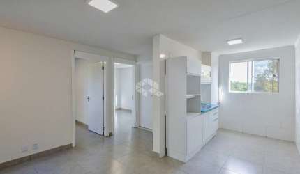 Apartamento reformado, 2 dormitórios, cozinha integrada com sala de estar, estacionamento, quiosque, bairro Santo Afonso, em Novo Hamburgo.