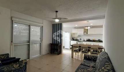 Apartamento 03 dormitórios mobiliado, 01 box na cidade de Capão da Canoa