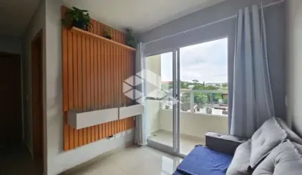 Apartamento de 2 quartos, sacada com churrasqueira e vaga no Morro Santana