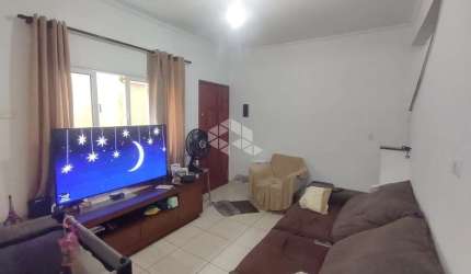 sobrado em condominio a venda na praia grande, bairro mirim com 2 quartos e 1 vaga.