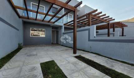 CASA 3 DORMITÓRIOS, 3 BANHEIROS E 2 VAGAS