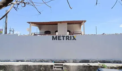 Casa duplex à venda por R$ 980.000 - Itaperi - Fortaleza/CE