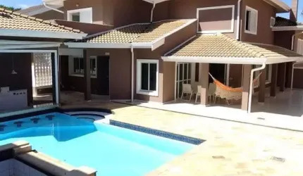 Sobrado com 4 dormitórios para alugar, 580 m² por R$ 17.261,00 - Alphaville - Campinas/SP