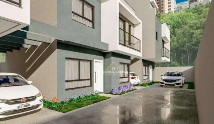 Sobrado com 3 dormitórios à venda, 122 m² por R$ 670.000,00 - Uberaba - Curitiba/PR
