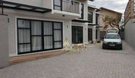 Sobrado 70 metros da praia em condomínio fechado à venda, 60 m² por R$ 750.000 - Centro - Penha/SC