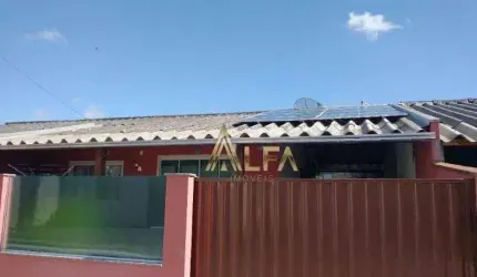 CASA COM PAINEL SOLAR EM CONDOMINIO FECHADO