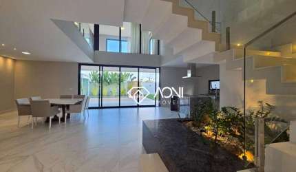 Casa com 4 dormitórios, 360 m² - venda por R$ 4.000.000,00 ou aluguel por R$ 15.095,28/mês - Alphaville Jacuhy - Serra/ES