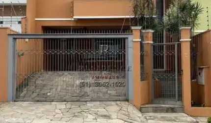 Casa com 3 quartos à venda na Rua Bélgica, 65, Marechal Rondon, Canoas, 300 m2 por R$ 1.300.000