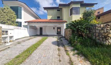 Sobrado com 4 quartos à venda em Jardim Acapulco - SP