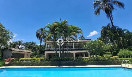 MAGNIFICA  RESIDÊNCIA TÉRREA,  COM  5.196m²,  no JARDIM DAS PALMEIRAS,  COM OPÇÃO DE PERMUTA