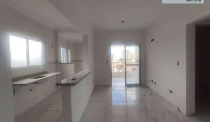 Apartamento com 2 dormitórios à venda, 62 m² por R$ 425.000,00 - Vila Guilhermina - Praia Grande/SP
