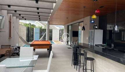 Casa contemporânea no Dream Garden com piscina, área gourmet e escritório