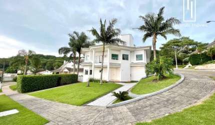 Casa em condomínio fechado com 5 quartos à venda na Rodovia Haroldo Soares Glavan, 929, Cacupé, Florianópolis por R$ 3.700.000