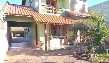 Sobrado com 3 dormitórios à venda, 221 m² por R$ 740.000,00 - Vila Veranópolis - Cachoeirinha/RS