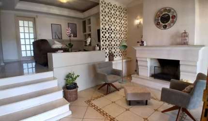 Sobrado com 4 dormitórios à venda, 259 m² por R$ 1.100.000,00 - Dom Feliciano - Gravataí/RS