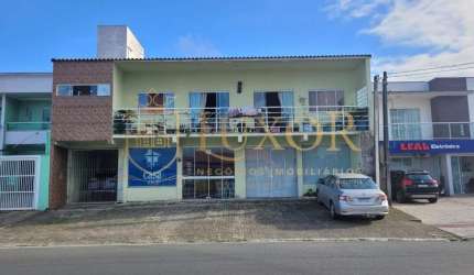 Linda casa tipo sobrado residencial e comercial em ótima  localização no Centro de Navegantes SC