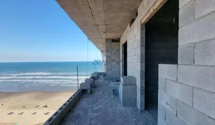 Apartamento em Praia Grande, Jd. Real com 2 quartos, 1 suíte, 70m²