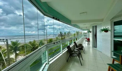 Apartamento à venda em Praia Grande, frente mar, mobiliado e com 3 suítes.