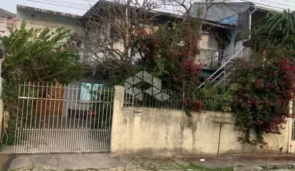 TERRENO COM DUAS CASAS EM SÃO JOSÉ - SC Á VENDA POR R$ 950.000,00.