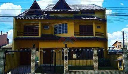 Casa com 4 dormitórios à venda, 400 m² por R$ 1.200.000,00 - Moinhos de Vento - Canoas/RS