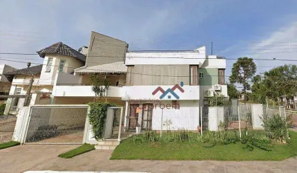 Casa com 3 dormitórios à venda, 174 m² por R$ 850.000,00 - Nossa Senhora das Graças - Canoas/RS