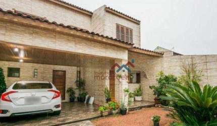 Sobrado com piscina e 4 dormitórios à venda, 164m² por R$ 636.000,00 - Igara - Canoas/RS