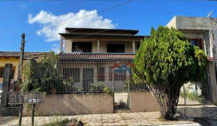 Casa com 4 dormitórios à venda, 200 m² por R$ 960.000,00 - Moinhos de Vento - Canoas/RS