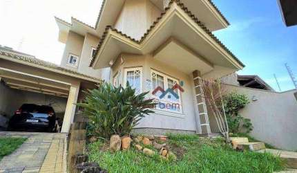 Casa com 3 dormitórios à venda, 175 m² por R$ 1.200.000,00 - Moinhos de Vento - Canoas/RS