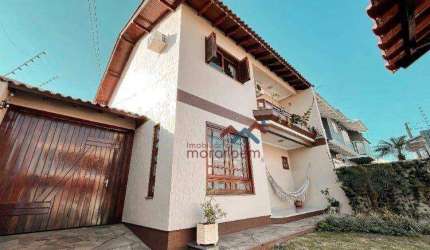 Casa com 3 dormitórios à venda, 190 m² por R$ 900.000,00 - Moinhos de Vento - Canoas/RS