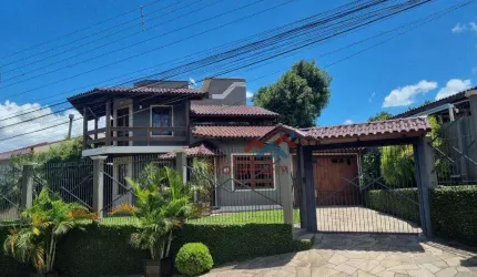 Casa com 3 dormitórios à venda, 250 m² por R$ 1.300.000 - Nossa Senhora das Graças - Canoas/RS
