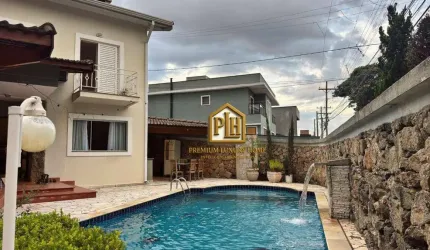 Casa com 3 dormitórios, 260 m² - venda por R$ 1.390.000,00 ou aluguel por R$ 9.500,00/mês - Vila Petrópolis - Atibaia/SP